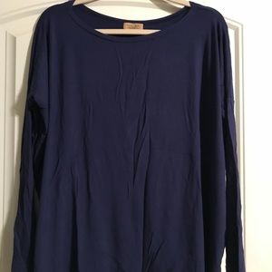 Long sleeve navy Piko tee.